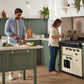 Rangemaster Classic Deluxe 110 Induction Range Cooker Pale Cream with Antique Brass Trim | CLDLB110EIPPCR/AB1